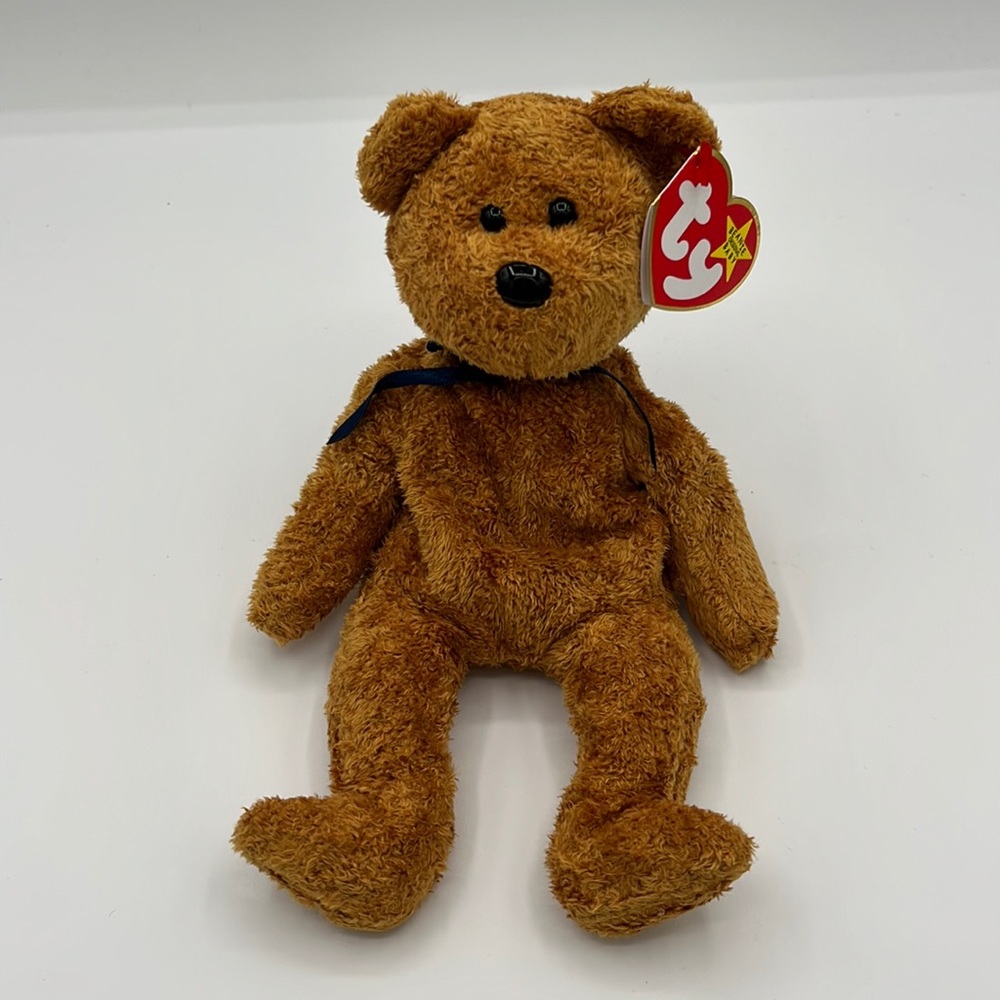 Ty Beanie Baby "Fuzz" the bear DOB 7/23/98